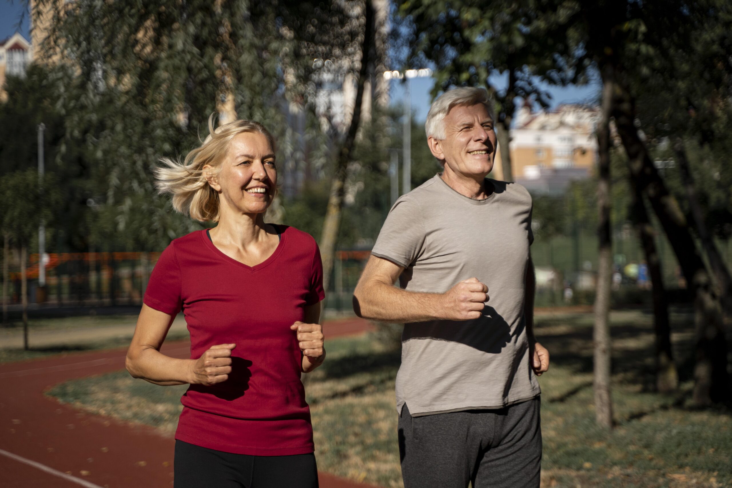 smiley-older-couple-jogging-outdoors-2